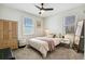 Cozy bedroom with natural light, ceiling fan and wardrobe at 2441 E 47Th Ave, Denver, CO 80216