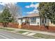 Beautiful view of the exterior elevation, showcasing its design, landscaping, and surrounding neighborhood at 2441 E 47Th Ave, Denver, CO 80216