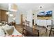 Cozy living room with bright, natural light, dining area and modern furnishings at 2441 E 47Th Ave, Denver, CO 80216