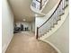 Finished basement featuring a home gym and winding staircase at 15454 W Auburn Ave, Lakewood, CO 80228