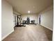 Basement home gym with multiple machines at 15454 W Auburn Ave, Lakewood, CO 80228