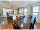 Kitchen with adjacent dining area and hardwood floors at 15454 W Auburn Ave, Lakewood, CO 80228