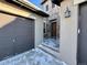 Front entrance with stone accents and a covered porch at 15454 W Auburn Ave, Lakewood, CO 80228