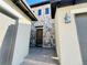 Stunning stone entryway with a beautiful wood door and elegant outdoor lighting at 15454 W Auburn Ave, Lakewood, CO 80228