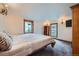 This bedroom features carpet flooring and windows that provide natural light at 400 Argentine St, Georgetown, CO 80444