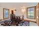 This dining room features hardwood floors and views from two windows for natural light at 400 Argentine St, Georgetown, CO 80444