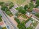 Aerial shot showcasing the property and surrounding neighborhood, mature trees, and convenient access to the main roads at 247 Tipple Pkwy, Frederick, CO 80530
