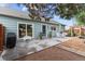 Cozy backyard patio with outdoor dining area, perfect for entertaining and enjoying outdoor living at 247 Tipple Pkwy, Frederick, CO 80530