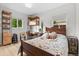 Cozy bedroom with bright, natural light from the window and tasteful decor at 247 Tipple Pkwy, Frederick, CO 80530