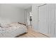 Cozy bedroom featuring a bed and built in closet at 247 Tipple Pkwy, Frederick, CO 80530