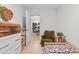 Charming bedroom with vintage furniture that provides lots of room for relaxing and playing at 247 Tipple Pkwy, Frederick, CO 80530