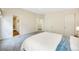 A spacious main bedroom boasts neutral tones and plush carpet at 7725 Hummingbird Green # 78, Frederick, CO 80530