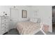 Bright bedroom with a double bed and built-in storage at 1415 W 68Th Ave, Denver, CO 80221