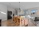 Open concept dining area with light wood furnishings at 1415 W 68Th Ave, Denver, CO 80221