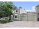 Charming two-story home with an attached two car garage, neutral exterior, and well-manicured lawn at 8997 W 88Th Ave, Westminster, CO 80021