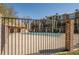Community pool area secured by a fence at 1885 S Quebec Way # A16, Denver, CO 80231