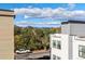 View of city skyline and distant mountains from balcony at 1412 Pierce St, Lakewood, CO 80214