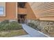 Exterior of home with stairs leading to the main entry and landscaping at 4281 S Salida Way # 8, Aurora, CO 80013
