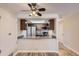 Open kitchen layout with stainless steel appliances and updated lighting at 4281 S Salida Way # 8, Aurora, CO 80013