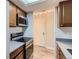 Modern kitchen featuring stainless steel appliances and ample cabinet space at 4281 S Salida Way # 8, Aurora, CO 80013