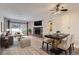 Inviting living room boasts a stone fireplace and sliding glass doors to outdoor view at 4281 S Salida Way # 8, Aurora, CO 80013