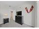 Bedroom featuring a dresser, tv, nightstand, and ensuite bathroom at 12896 Ironstone Way # 203, Parker, CO 80134