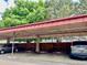 Covered carport for parking and keeping cars shaded at 7455 E Quincy Ave # 204, Denver, CO 80237