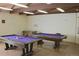 Recreational game room with pool tables and foosball, perfect for entertainment at 7455 E Quincy Ave # 204, Denver, CO 80237