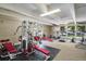 Community gym has different workout machines, weights, and a treadmill for the residents at 7455 E Quincy Ave # 204, Denver, CO 80237
