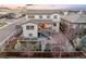 Aerial view of home showcasing a landscaped backyard, patio, and covered deck at 11100 Pastel Pt, Parker, CO 80134