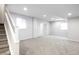 Large basement with carpet and stairs, ready for finishing and customization at 11100 Pastel Pt, Parker, CO 80134