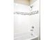 Bathroom shower featuring modern chrome fixtures and a decorative gray mosaic accent at 11100 Pastel Pt, Parker, CO 80134