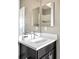 Bathroom featuring modern fixtures, mirror, and decor at 11100 Pastel Pt, Parker, CO 80134