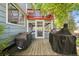 Cozy patio with outdoor grill and furniture, perfect for entertaining at 11431 W Lake Dr, Littleton, CO 80127