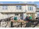 View of townhome backyard with patio and wood fence at 3006 W 107Th Pl # D, Westminster, CO 80031