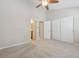 Spacious bedroom with neutral carpet and trim, multiple closets, and ensuite bathroom at 3006 W 107Th Pl # D, Westminster, CO 80031