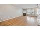 Bright living room features hardwood floors, natural light, and a cozy fireplace at 3006 W 107Th Pl # D, Westminster, CO 80031