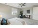 Relaxing bedroom with a chair, stylish accents, and natural light at 1592 Maggie Mae Ln, Castle Rock, CO 80104