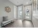 Inviting entryway featuring modern decor, stylish bench seating, and sleek flooring at 1592 Maggie Mae Ln, Castle Rock, CO 80104
