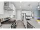 Well-equipped kitchen with stainless steel appliances and sleek countertops at 1592 Maggie Mae Ln, Castle Rock, CO 80104