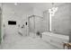 Bright and modern bathroom with marble countertops, glass shower, and freestanding tub at 2821 E Cedar Ave # 17, Denver, CO 80209