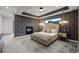 Elegant bedroom with decorative wallpaper, fireplace, stylish lighting, and plush carpeting at 2821 E Cedar Ave # 17, Denver, CO 80209