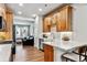 Modern kitchen with stainless appliances and open view to the living room at 888 S Valentia St # 14-103, Denver, CO 80247
