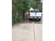 White Ford truck parked on concrete driveway at 6911 Weiman Ct, Commerce City, CO 80022