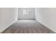 Spacious bedroom with neutral carpet, a window, and ample natural light at 25254 E Warren Pl, Aurora, CO 80018