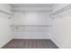 Walk-in closet with carpeted floor and shelving and plenty of room for storage at 25254 E Warren Pl, Aurora, CO 80018