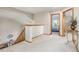 Upstairs hallway with a stairwell with oak railings, and doorways leading to bedrooms at 5048 Rocky Mountain Dr, Castle Rock, CO 80109