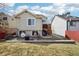 A large backyard with a small deck and outdoor seating area at 5237 W 100Th Ct, Westminster, CO 80020