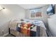 Bedroom featuring a window and a flatscreen television at 5237 W 100Th Ct, Westminster, CO 80020