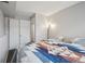 Bedroom featuring a patterned comforter and a closet at 5237 W 100Th Ct, Westminster, CO 80020